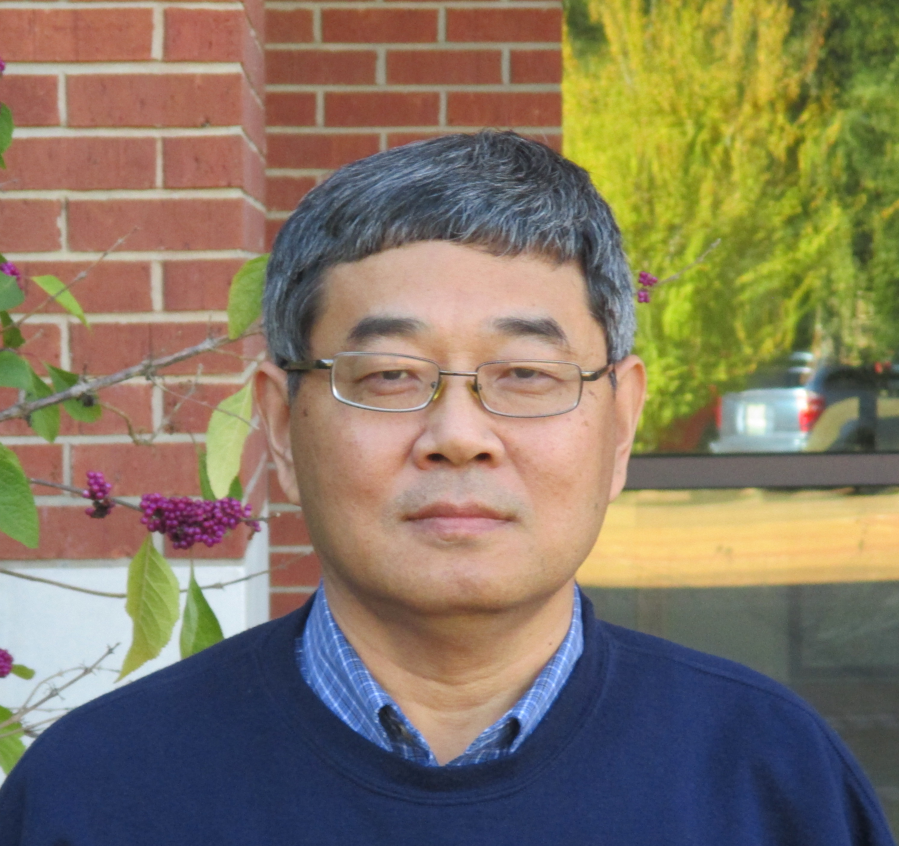 Dr. Guiming  Wang